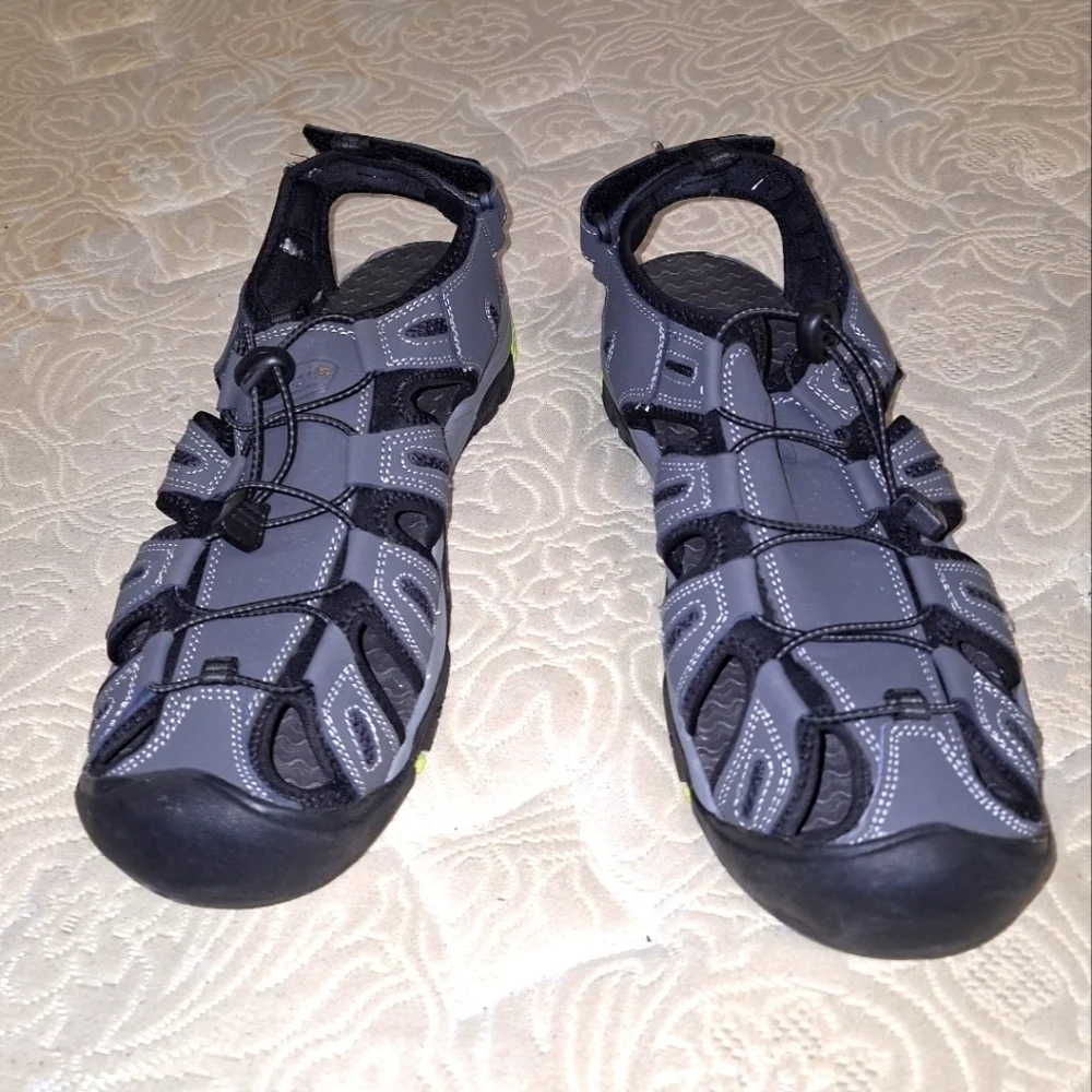 A pair of Coleman George sandals in a men's size 13M. They're in excellent shape